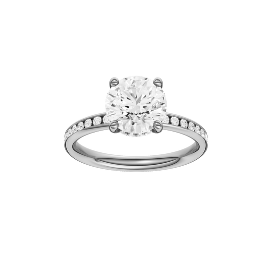 Round-cut diamond engagement ring with a channel-set diamond band and hidden-halo setting.