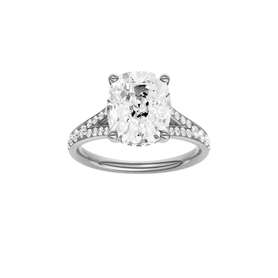 Elongated cushion-cut diamond engagement ring with a channel-set diamond band and hidden-halo setting.