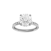 Round-cut diamond engagement ring with a channel-set diamond band and hidden-halo setting.