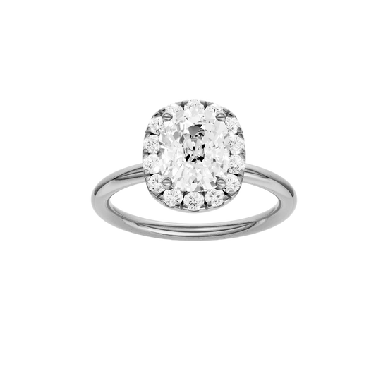 Elongated cushion-cut diamond engagement ring in 14k white gold with a plain band and halo setting