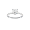 Round-cut diamond engagement ring with a prong-set diamond band and hidden-halo setting.