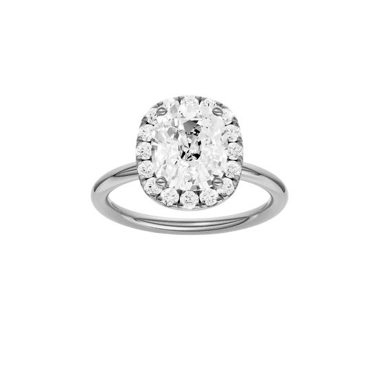 Elongated cushion-cut diamond engagement ring in 14k white gold with a plain band and halo setting