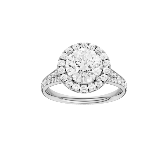 Round-cut diamond engagement ring with a channel-set diamond band and halo setting.