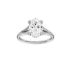 Oval-cut diamond engagement ring with a plain band and hidden-halo setting.