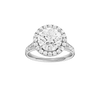 Round-cut diamond engagement ring with a channel-set diamond band and halo setting.