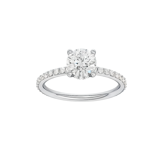 Round-cut diamond engagement ring with a prong-set diamond band and hidden-halo setting.