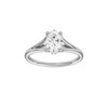 Oval-cut diamond engagement ring with a plain band and hidden-halo setting.