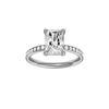 Radiant-cut diamond engagement ring with a channel-set diamond band and solitaire setting.