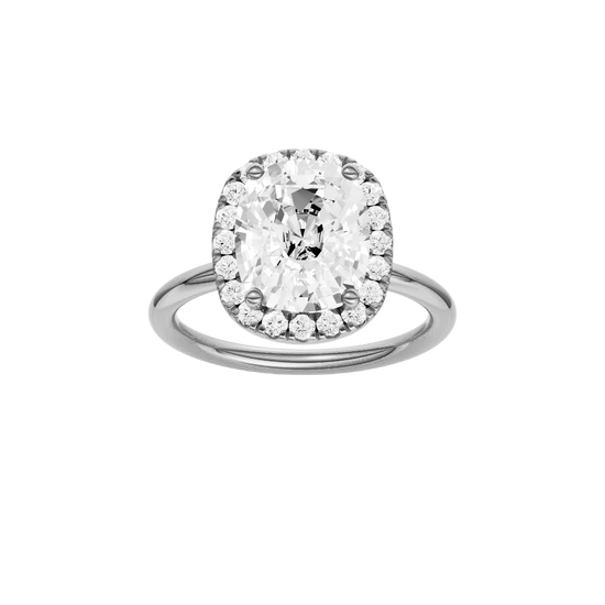 Elongated cushion-cut diamond engagement ring in 14k white gold with a plain band and halo setting