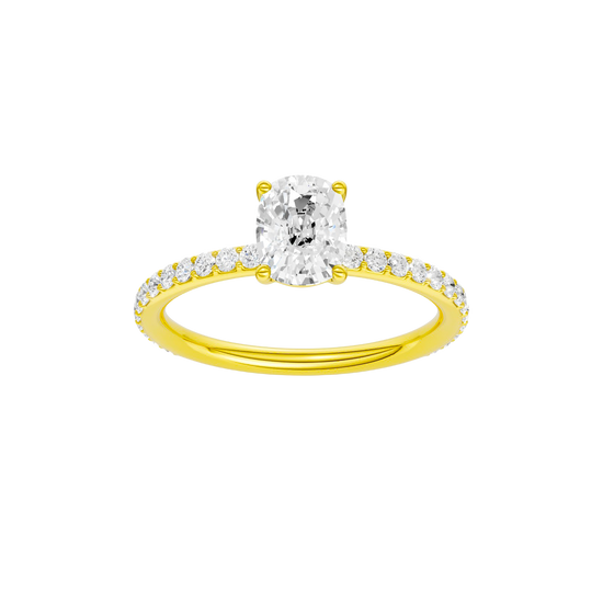 Elongated cushion-cut diamond engagement ring with a prong-set diamond band and solitaire setting.