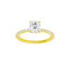 Elongated cushion-cut diamond engagement ring with a prong-set diamond band and solitaire setting.