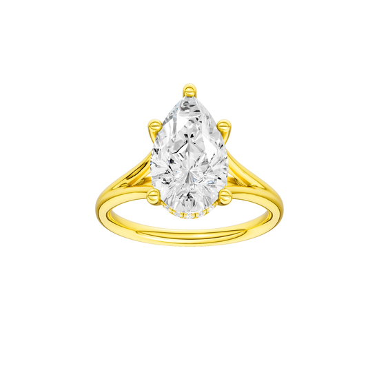 Pear-cut diamond engagement ring with a plain band and hidden-halo setting.