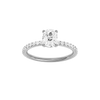 Elongated cushion-cut diamond engagement ring with a prong-set diamond band and solitaire setting.