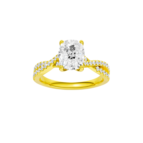 Elongated cushion-cut diamond engagement ring in 14k yellow gold with a prong-set diamond band and cathedral setting