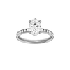 Oval-cut diamond engagement ring with a channel-set diamond band and solitaire setting.