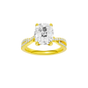 Elongated cushion-cut diamond engagement ring in 14k yellow gold with a prong-set diamond band and cathedral setting