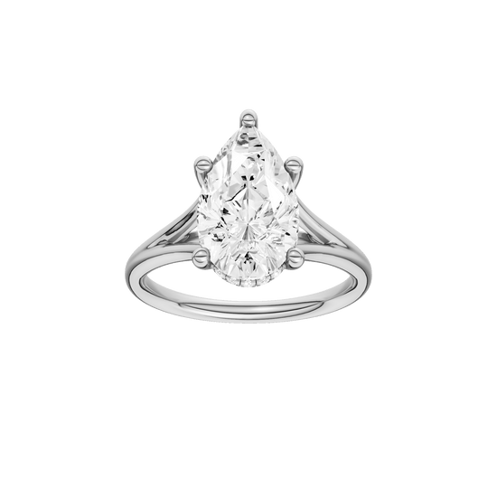 Pear-cut diamond engagement ring with a plain band and hidden-halo setting.