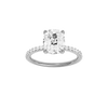 Elongated cushion-cut diamond engagement ring with a prong-set diamond band and solitaire setting.
