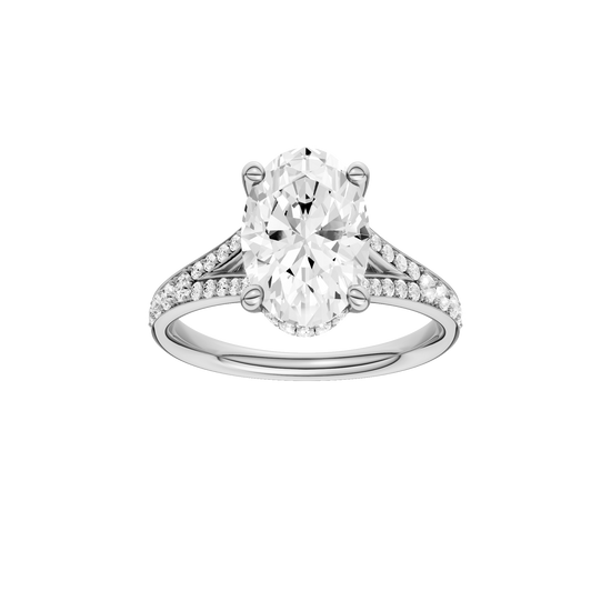 Oval-cut diamond engagement ring with a channel-set diamond band and hidden-halo setting.
