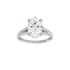 Oval-cut diamond engagement ring with a channel-set diamond band and hidden-halo setting.