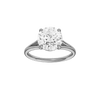 Round-cut diamond engagement ring with a plain band and solitaire setting.