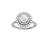 Round-cut diamond engagement ring with a plain band and double-halo setting.