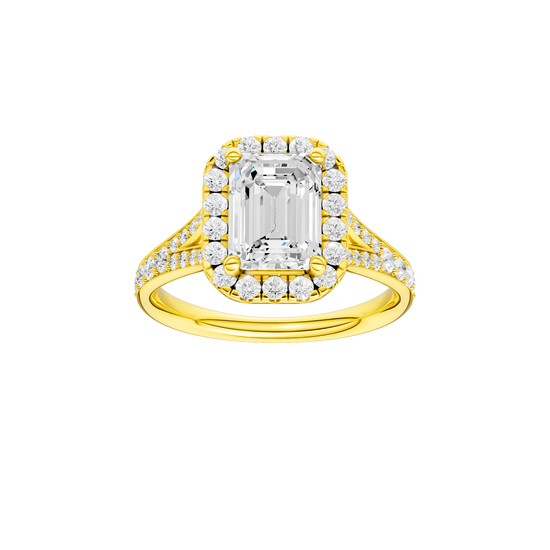 Emerald-cut diamond engagement ring with a channel-set diamond band and halo setting.