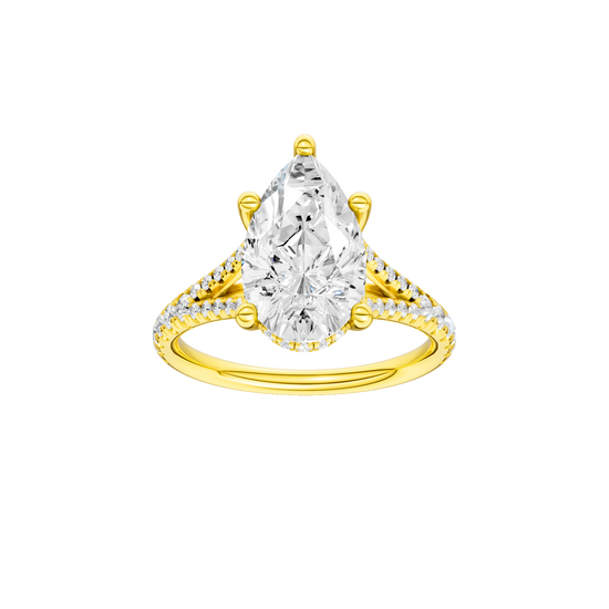 Pear-cut diamond engagement ring with a prong-set diamond band and hidden-halo setting.