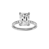 Radiant-cut diamond engagement ring with a channel-set diamond band and hidden-halo setting.