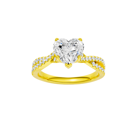 Heart-cut diamond engagement ring in 14k yellow gold with a prong-set diamond band and twist setting