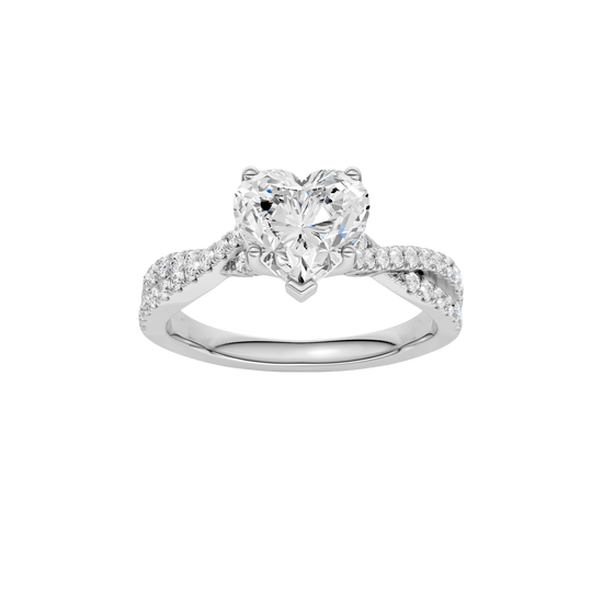Heart-cut diamond engagement ring in 14k white gold with a prong-set diamond band and twist setting