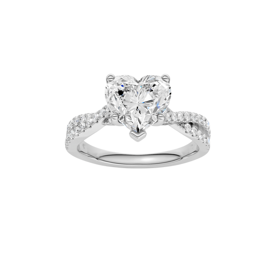 Heart-cut diamond engagement ring in 14k white gold with a prong-set diamond band and twist setting