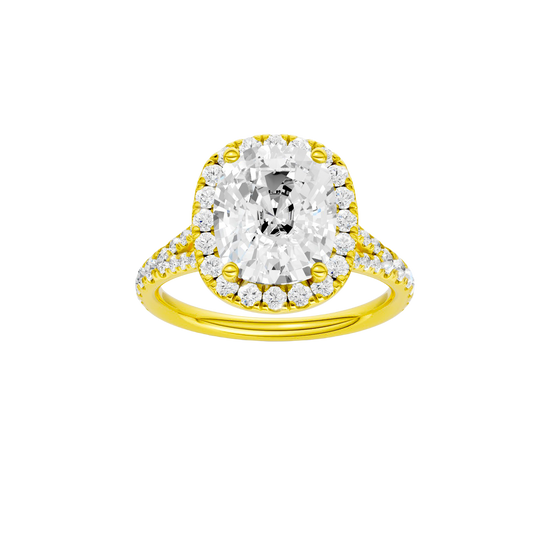 Elongated cushion-cut diamond engagement ring with a prong-set diamond band and halo setting.