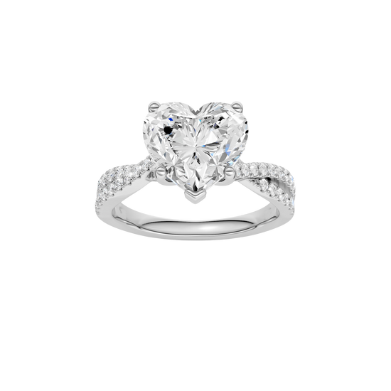 Heart-cut diamond engagement ring in 14k white gold with a prong-set diamond band and twist setting