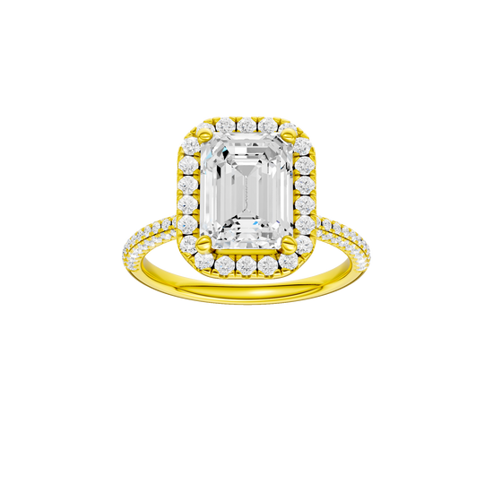 Emerald-cut diamond engagement ring with a pavé-set diamond band and halo setting.