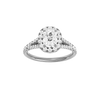 Elongated cushion-cut diamond engagement ring with a prong-set diamond band and halo setting.