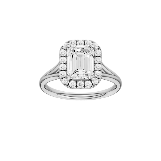 Emerald-cut diamond engagement ring with a plain band and halo setting.