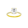 Elongated cushion-cut diamond engagement ring with a pavé-set diamond band and hidden-halo setting.