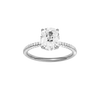 Elongated cushion-cut diamond engagement ring with a pavé-set diamond band and hidden-halo setting.