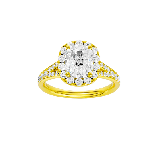 Elongated cushion-cut diamond engagement ring with a channel-set diamond band and halo setting.