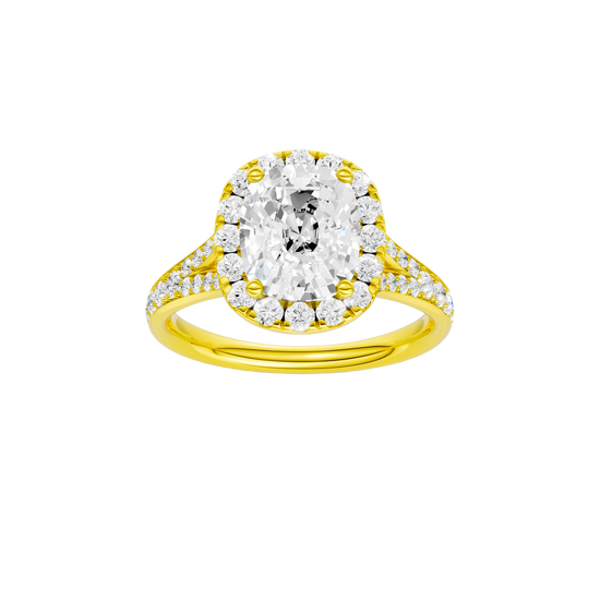 Elongated cushion-cut diamond engagement ring with a channel-set diamond band and halo setting.