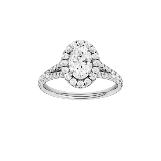 Oval-cut diamond engagement ring with a prong-set diamond band and halo setting.