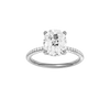 Elongated cushion-cut diamond engagement ring with a pavé-set diamond band and hidden-halo setting.