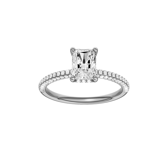 Radiant-cut diamond engagement ring with a pavé-set diamond band and hidden-halo setting.