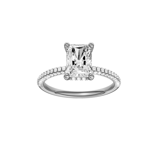 Radiant-cut diamond engagement ring with a pavé-set diamond band and hidden-halo setting.