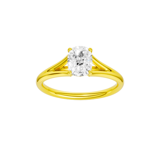 Elongated cushion-cut diamond engagement ring with a plain band and solitaire setting.