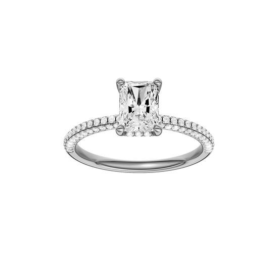 Radiant-cut diamond engagement ring with a pavé-set diamond band and hidden-halo setting.