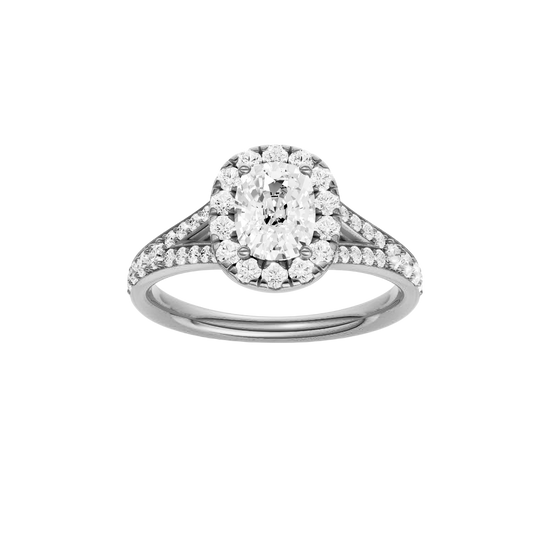Elongated cushion-cut diamond engagement ring with a channel-set diamond band and halo setting.