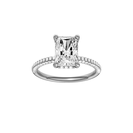 Radiant-cut diamond engagement ring with a pavé-set diamond band and hidden-halo setting.