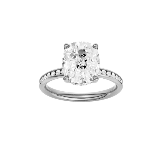 Elongated cushion-cut diamond engagement ring with a channel-set diamond band and hidden-halo setting.